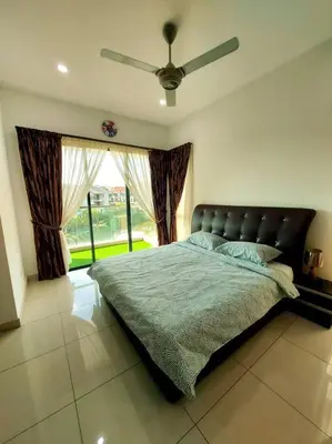a bedroom with a bed and a ceiling fan at ●STG12●3-Storey●Private House●2step Access Garden● in Bayan Lepas