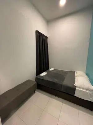 a small bedroom with a bed and a window at Golden Hill Home by Dreamscape in Cameron Highlands