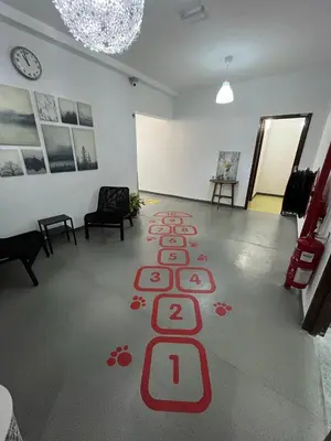 a room with a red carpet on the floor at Knight Alley Hotel in Taiping