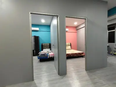 a room with a door leading to a bedroom at Alish Homestay Gua Musang with Free WiFi, Netflix in Gua Musang