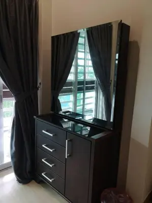a dresser with a mirror on top of it at W13 atGoldenHills NightMarket WiFi 4R in Brinchang