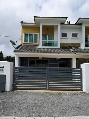 a large house with a fence in front of it at W36 WarmStay atGoldenHills NightMarket 4R Wifi BBQ in Brinchang