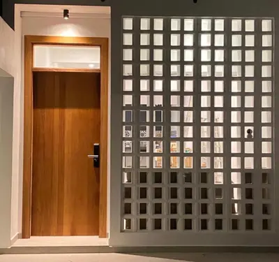 a door in a room with a wall of glass at Guesthouse @ Ipoh garden II in Ipoh