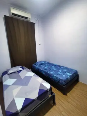 a small bedroom with a bed and a window at Homestay De' Humaira - USM Nibong Tebal in Nibung Tebal