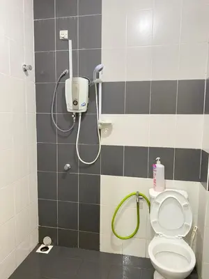 a bathroom with a shower with a toilet at Azzalea Homes 5 @ Golden Hills Cameron Highlands in Brinchang