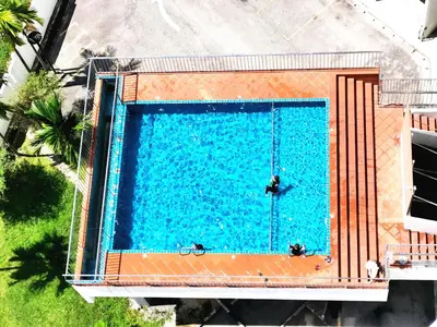 an overhead view of a swimming pool at TuR11-Oppesite Pisa Stadium-1min-FoodCourt-MiniMarket in Bayan Lepas