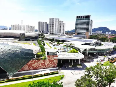 a view of a building in a city at TuR11-Oppesite Pisa Stadium-1min-FoodCourt-MiniMarket in Bayan Lepas