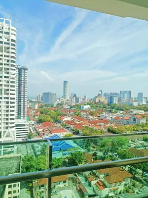 a view of a city from the balcony of a building at Mansion One Two Bedroom Seaview 7 Pax in George Town
