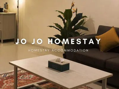 a living room with a coffee table with a box on it at Jo Jo Homestay @ Marina Island Laguna in Lumut