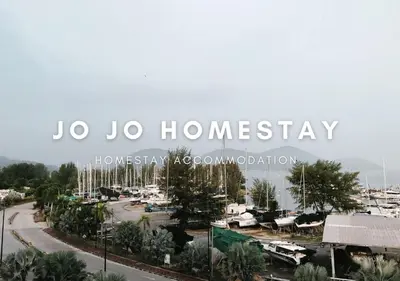 a sign that reads yo yo honeyayahuatownatownatownatownlation at Jo Jo Homestay @ Marina Island Laguna in Lumut