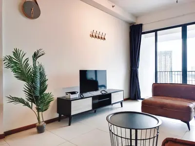 a living room with a tv and a couch at The Landmark by Katana 3BR to 4BR Luxury Seaview Landmark Homestay at Gurney 15-16pax \u65e0\u654c\u6d77\u666f\u5957\u623f in Tanjong Tokong