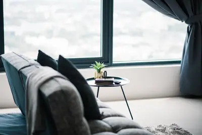 a living room with a couch and a table at The GRANDE @ Tropicana 218 Macalister in George Town