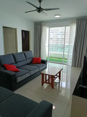 a living room with a couch and a table at Mansion One 3 Bedroom SEAVIEW Gurney Georgetown 1-13Pax in George Town