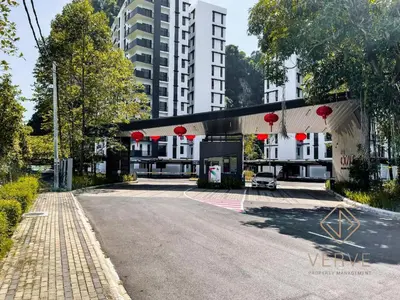 a building with red lanterns on the side of a street at Ipoh Cove Premium Suites by Verve in Ipoh