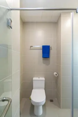 a bathroom with a toilet and a glass shower at Deluxe & Feel Like a Home 2, 3-6pax, Netflix, Georgetown in Jelutong