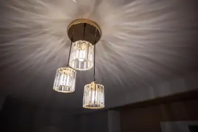 a cluster of lights hanging from a ceiling at Loft Pano Seaview Suite 2 Bedroom by The Only Bnb in Jelutong