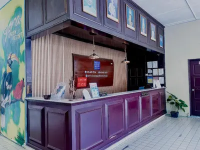 a purple counter in a restaurant with at Kejora Garden Resort Pulau Pangkor in Pasir Bogak