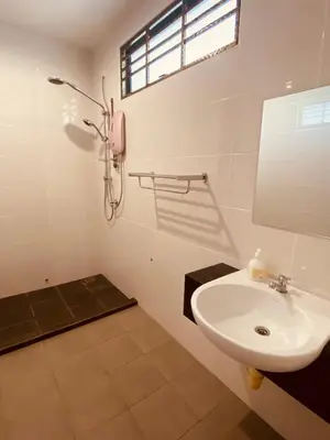 a white bathroom with a sink and a phone at 50PAX 9BR Villa Kids Swimming Pool, KTV, BBQ n Pool Tables near SPICE Arena Penang 9800 SQFT in Bayan Lepas