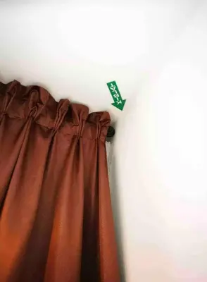 a curtain hanging on a wall with a price tag at #CameronHighlands homestay in Brinchang
