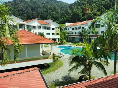 an aerial view of a resort with a swimming pool at C 13 Lot 10 Pangkor Leisure Beach Studio in Pangkor