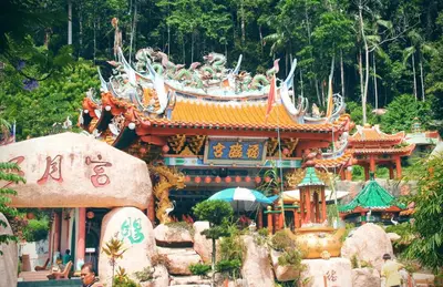 a building with a bunch of statues on top of it at C 13 Lot 10 Pangkor Leisure Beach Studio in Pangkor