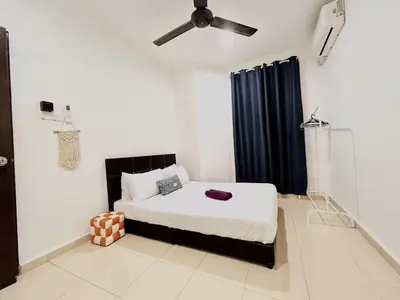 a bedroom with a bed and a ceiling fan at Cozy 288 Entire 3 bedroom House @ Alma Bukit Mertajam in Bukit Mertajam