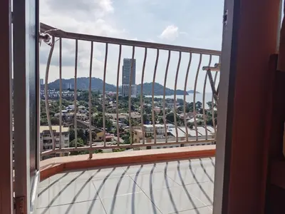 a view of a city from a balcony at Coastside Homestay in George Town