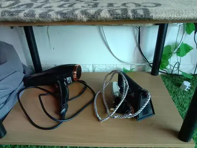 a purse and a chain on a table at D&C Homestay A Modern Forest Boutique in Brinchang