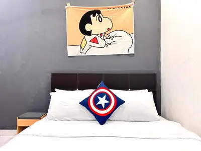 a painting of captain america on the wall above a bed at Cozy Murni 14th Entire 3 Bedroom House at Alma Bkt Mertajam in Bukit Mertajam