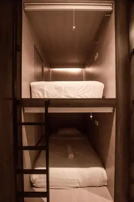 a bunk room with a bunk bed in it at Amazing Home Inn in George Town