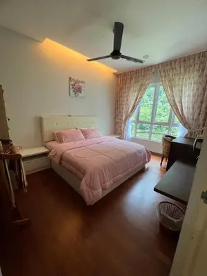 a bedroom with a bed and a ceiling fan at Ipoh The Heyven Lakeside Homestay by Quadvanos in Ipoh