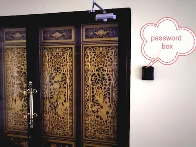 a room with a black and gold door with a pinkogged box at Fastbook Ferringhi SoHo unit 8pax in Batu Ferringhi
