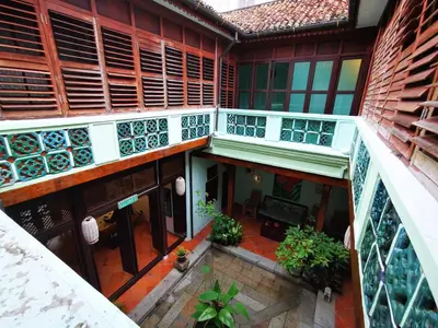 an overhead view of a building with a balcony at East Indies Mansion in George Town