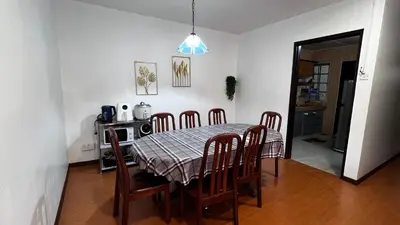 a dining room table and chairs in a room at THE MILKY WAY @ PINE RESORT in Bukit Fraser