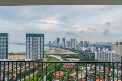 a view of a city skyline with tall buildings at Deluxe Seaview Suite Twin Bed by The Only Bnb in Tanjong Tokong