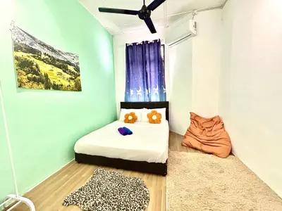 a bedroom with a bed with two teddy bears on it at Cozy 18 Entire 3 Bedroom @Alma Bukit Mertajam in Bukit Mertajam
