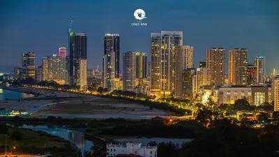 a city skyline at night with tall buildings at Deluxe Seaview Suite Twin Bed by The Only Bnb in Tanjong Tokong