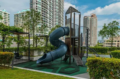 a playground with a slide in a city at Family Seaview Suite with 3 Rooms by The Only Bnb in Tanjong Tokong