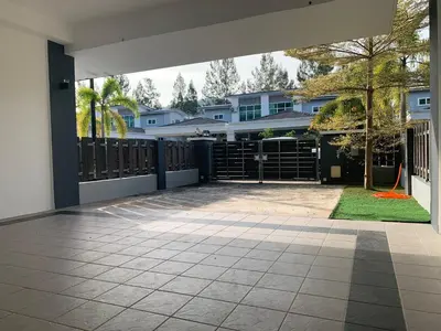 an empty patio in a house with a fence at Omari Marina Island Homestay Lumut in Lumut