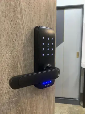 a black phone is attached to a door at Kota Permai Free n Easy Interior Bukit Mertajam in Bukit Mertajam