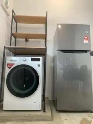 a washing machine and a refrigerator in a room at Kota Permai Mini Rest Room 99 Full Equipped in Bukit Mertajam