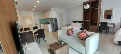 a living room with a couch and a bedroom at LS Mansion One in George Town