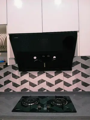 a black stove top in a kitchen with a tile floor at Preferred30 3R2B 7pax Meritus Perai in Perai