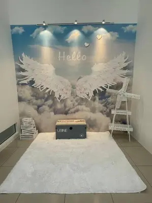 a room with a mural of two white birds at De cozy 5.0 Double storey (10-16 pax ++) in Ipoh