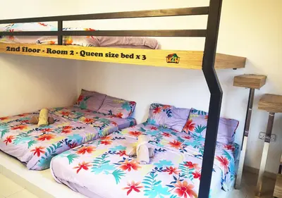 a bedroom with a bunk bed with two beds at H2H - CY Botani Vacation House (15pax) in Ipoh