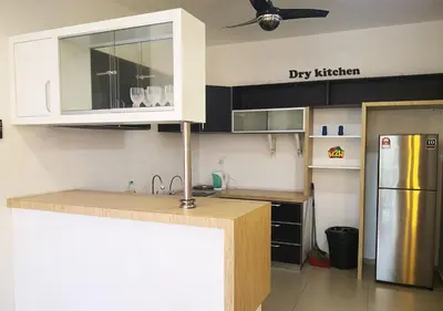 a kitchen with a sink and a refrigerator at H2H - CY Botani Vacation House (15pax) in Ipoh