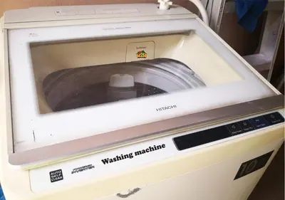 an electronic machine with a washing machine at H2H - CY Botani Vacation House (15pax) in Ipoh