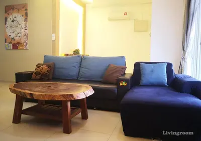 a living room with a couch and a coffee table at H2H - CY Botani Vacation House (15pax) in Ipoh