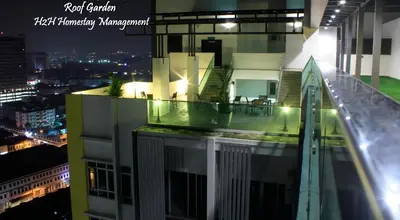 a view of a building with a balcony at night at H2H - CY15 @ Majestic Ipoh in Ipoh