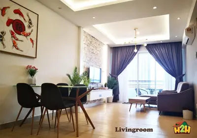 a living room with a dining room table and chairs at H2H - CY15 @ Majestic Ipoh in Ipoh